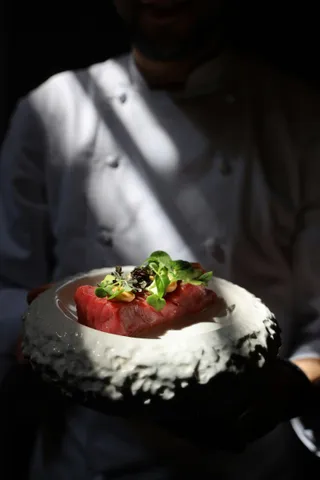 A plated course held in a beam of light